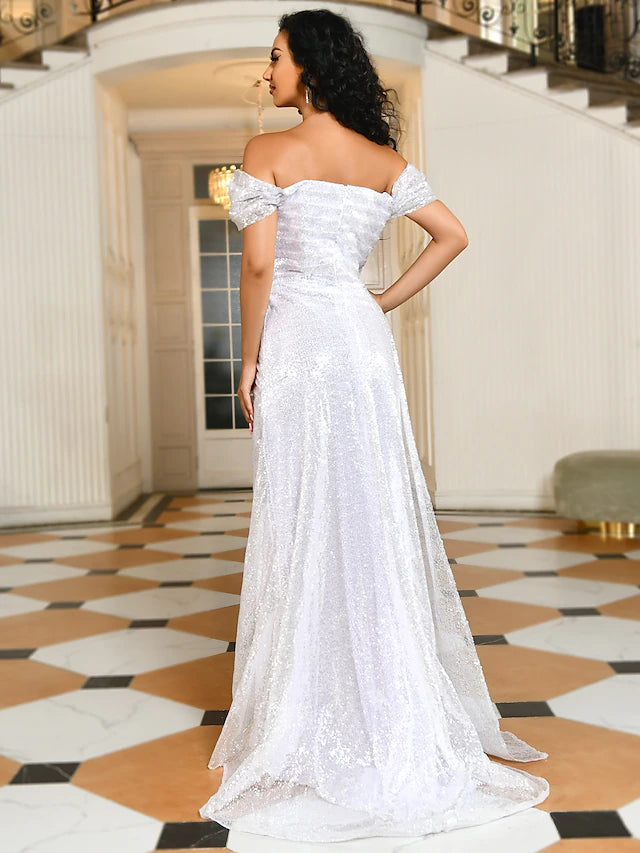 Woman showcasing the convertible style of the off-shoulder sequin evening gown.