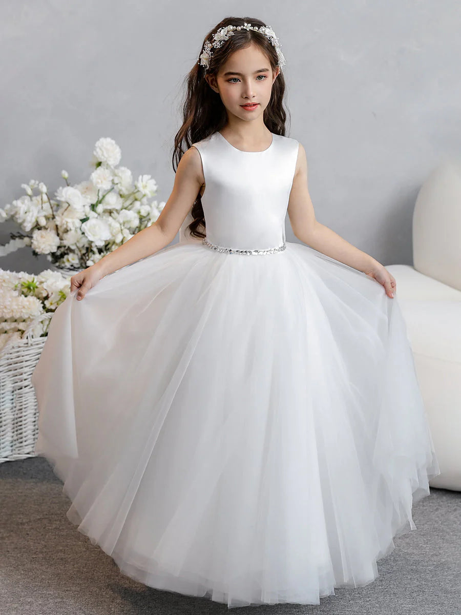 Front view of an elegant blush pink crew neck tulle flower girl dress.