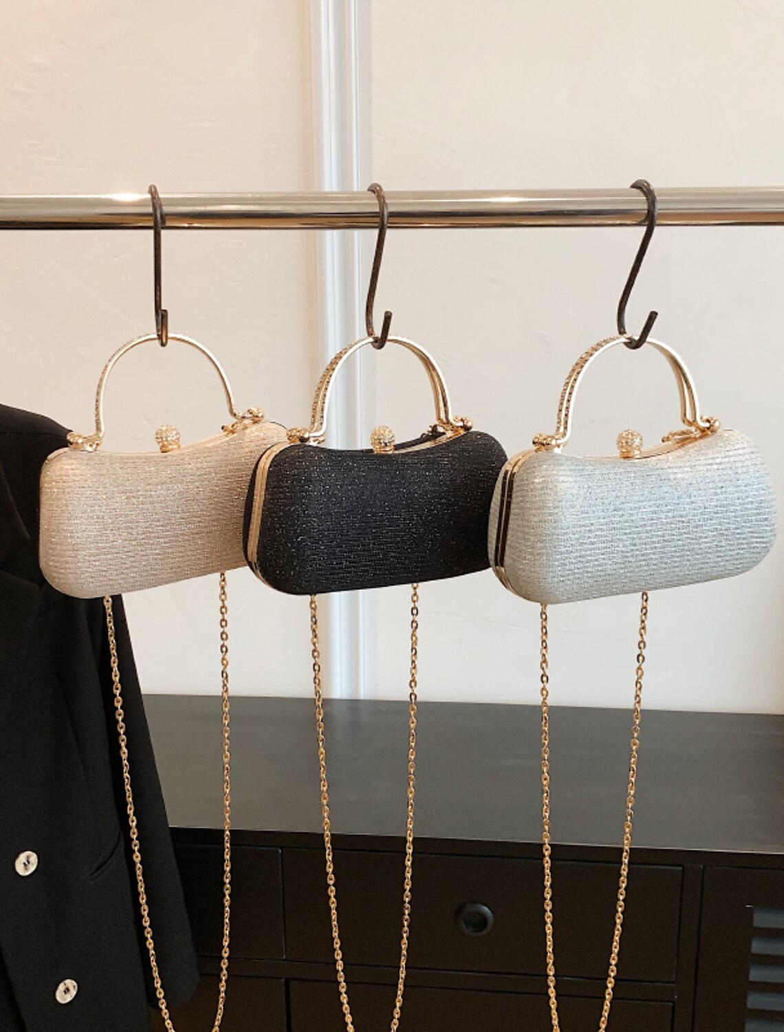 Synthetic crystal evening bag with metallic clasp.