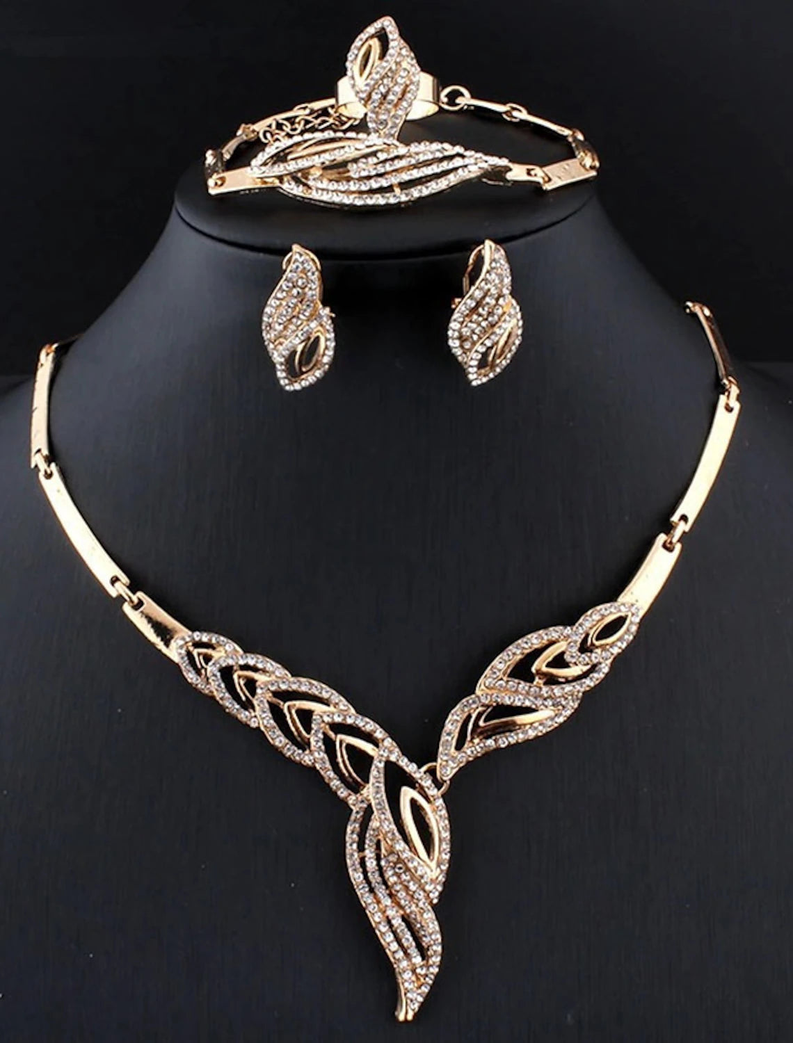 Detailed view of the crystal rhinestone bridal bracelet and adjustable ring.