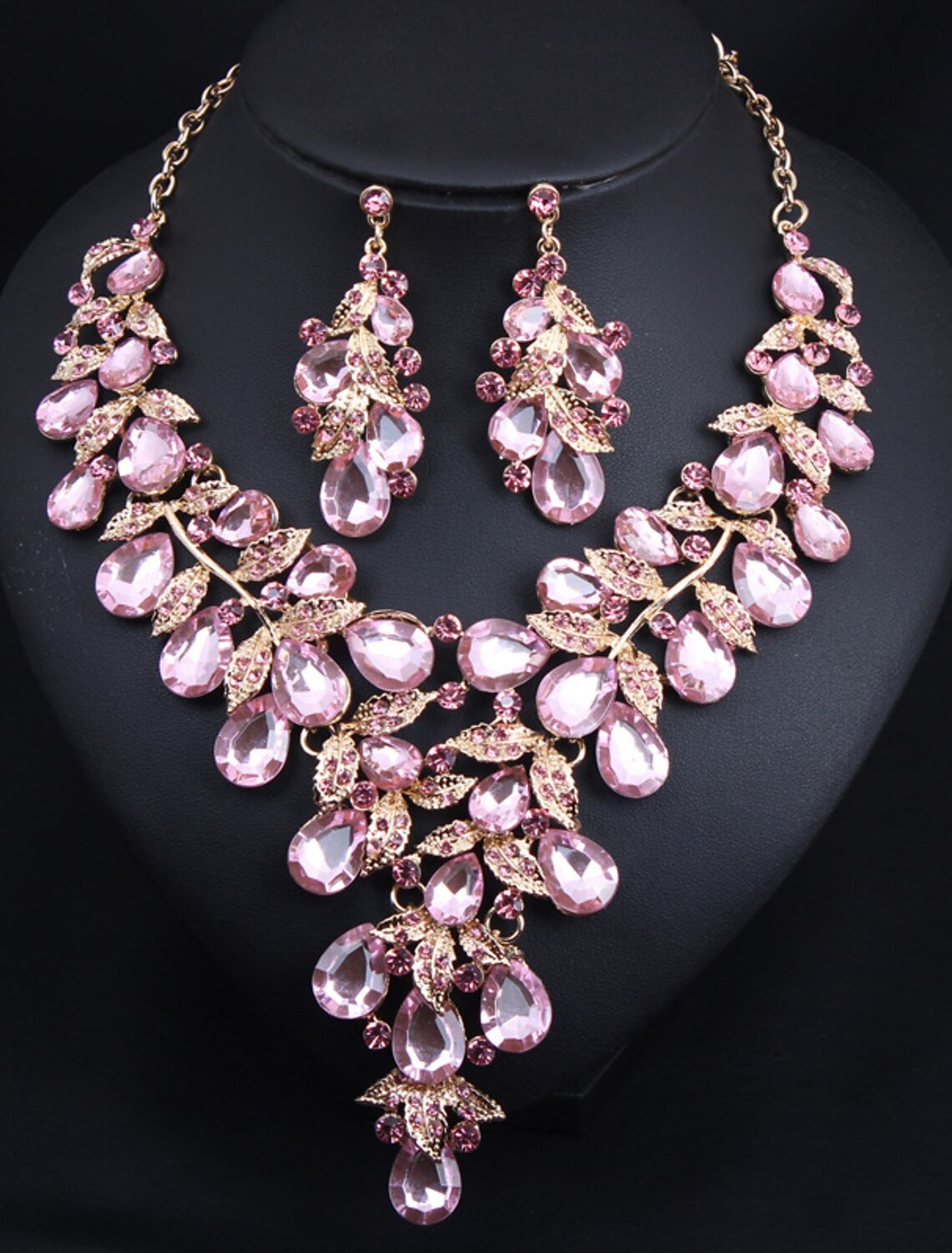 Elegant crystal rhinestone flower necklace and matching earrings set.