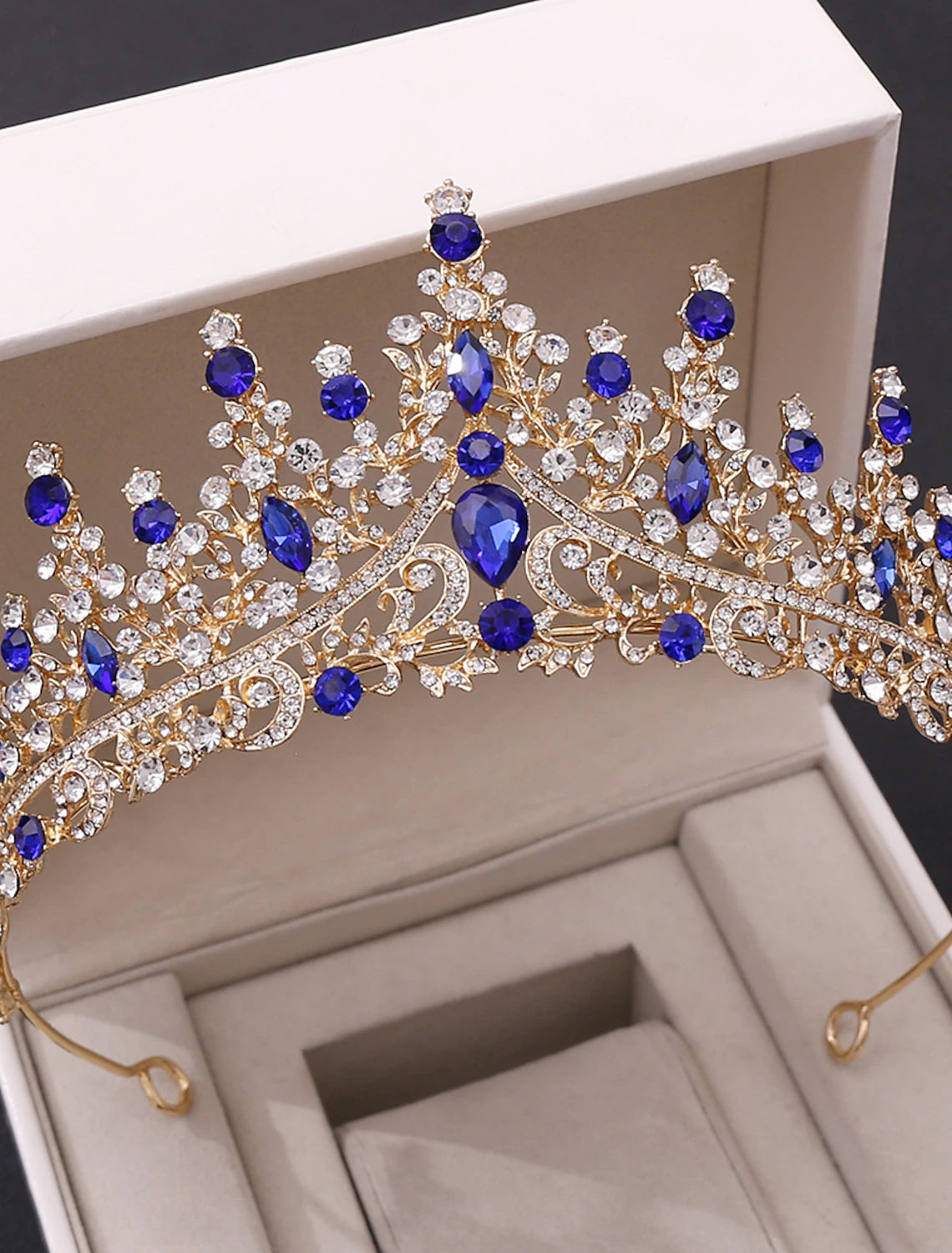 Close-up of crystal and rhinestone embellishments on tiara.