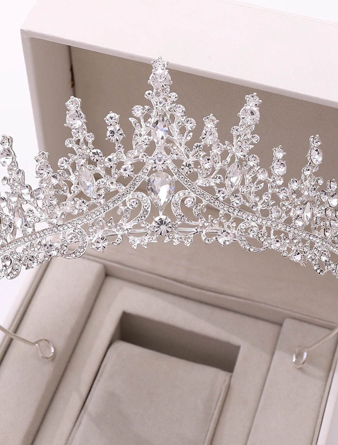 Bridal crown tiara with intricate crystal and rhinestone details.
