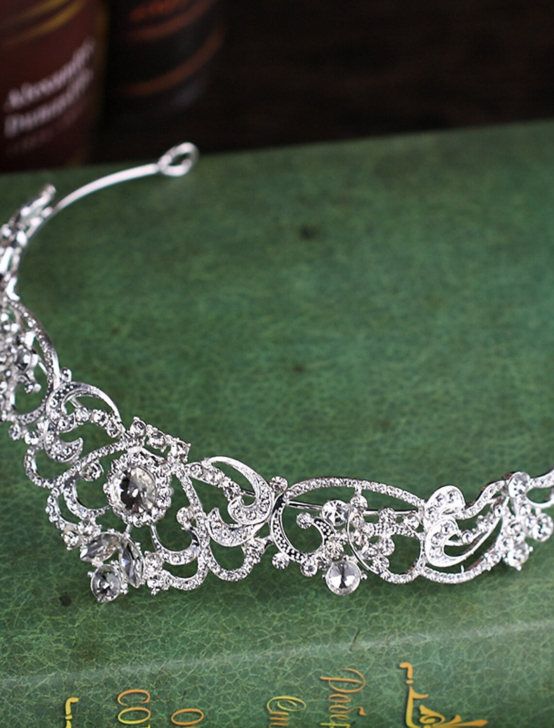 Sparkling rhinestone and alloy crown headpiece.