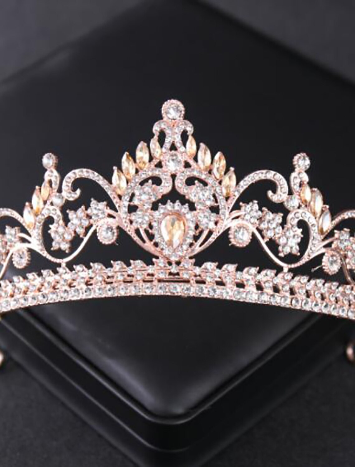 Sparkling bridal headwear with intricate rhinestone design.