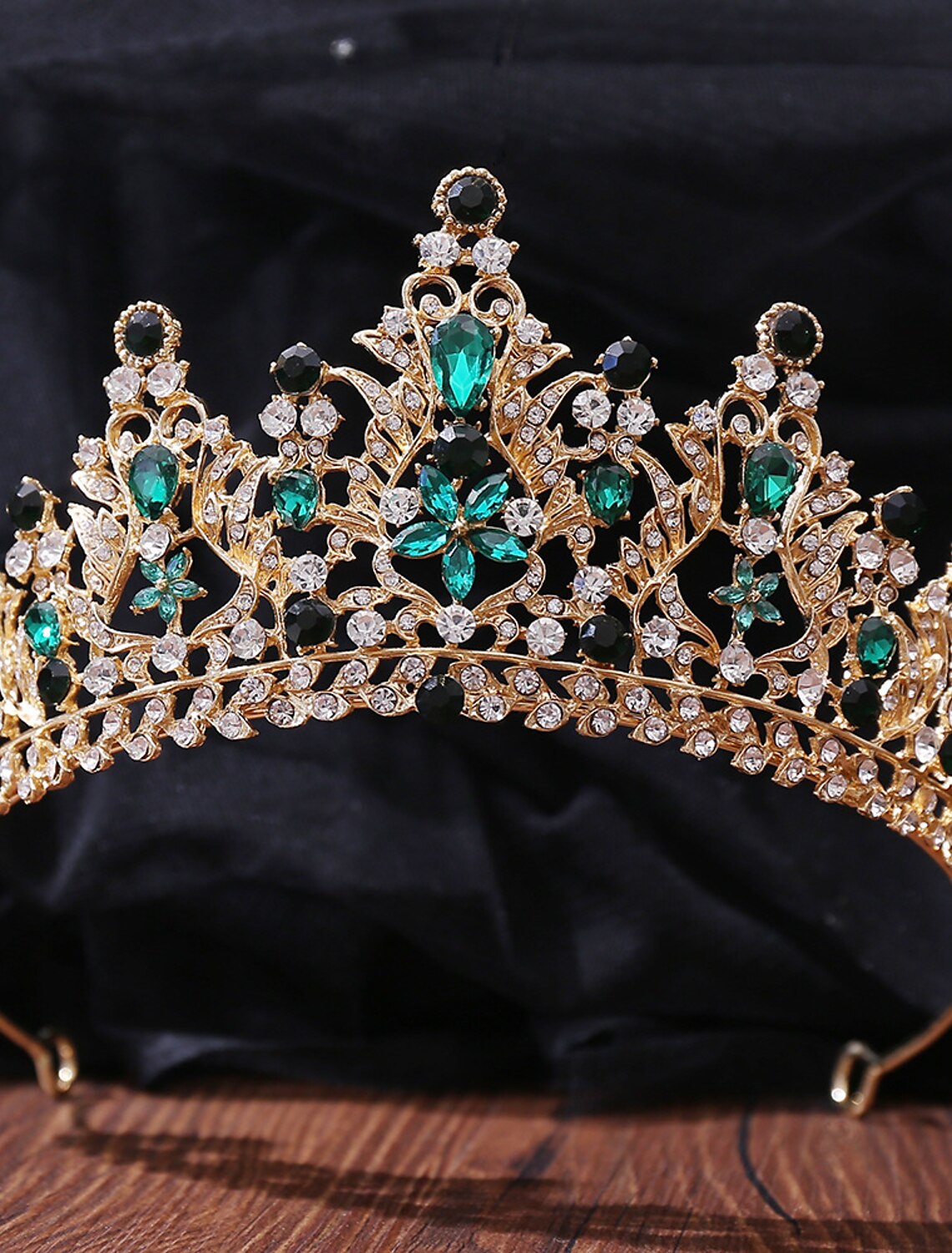 Front view of a vintage-inspired crystal tiara.