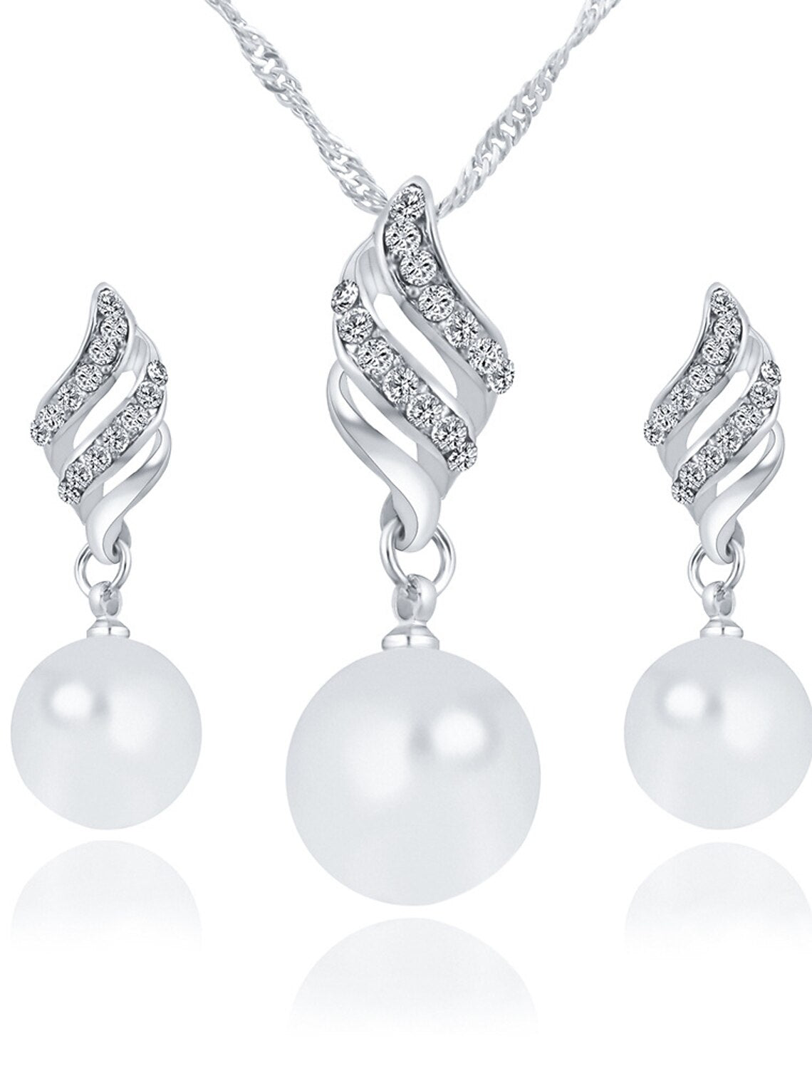 The complete crystal and imitation pearl infinity jewelry set displayed.