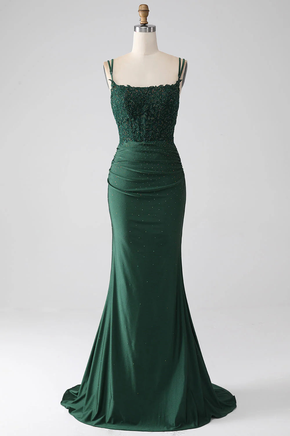 Elegant dark green mermaid prom dress with spaghetti straps and corset bodice.