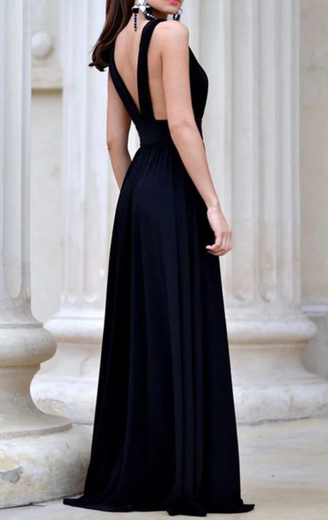 Full length view of the deep V-neck formal prom dress.