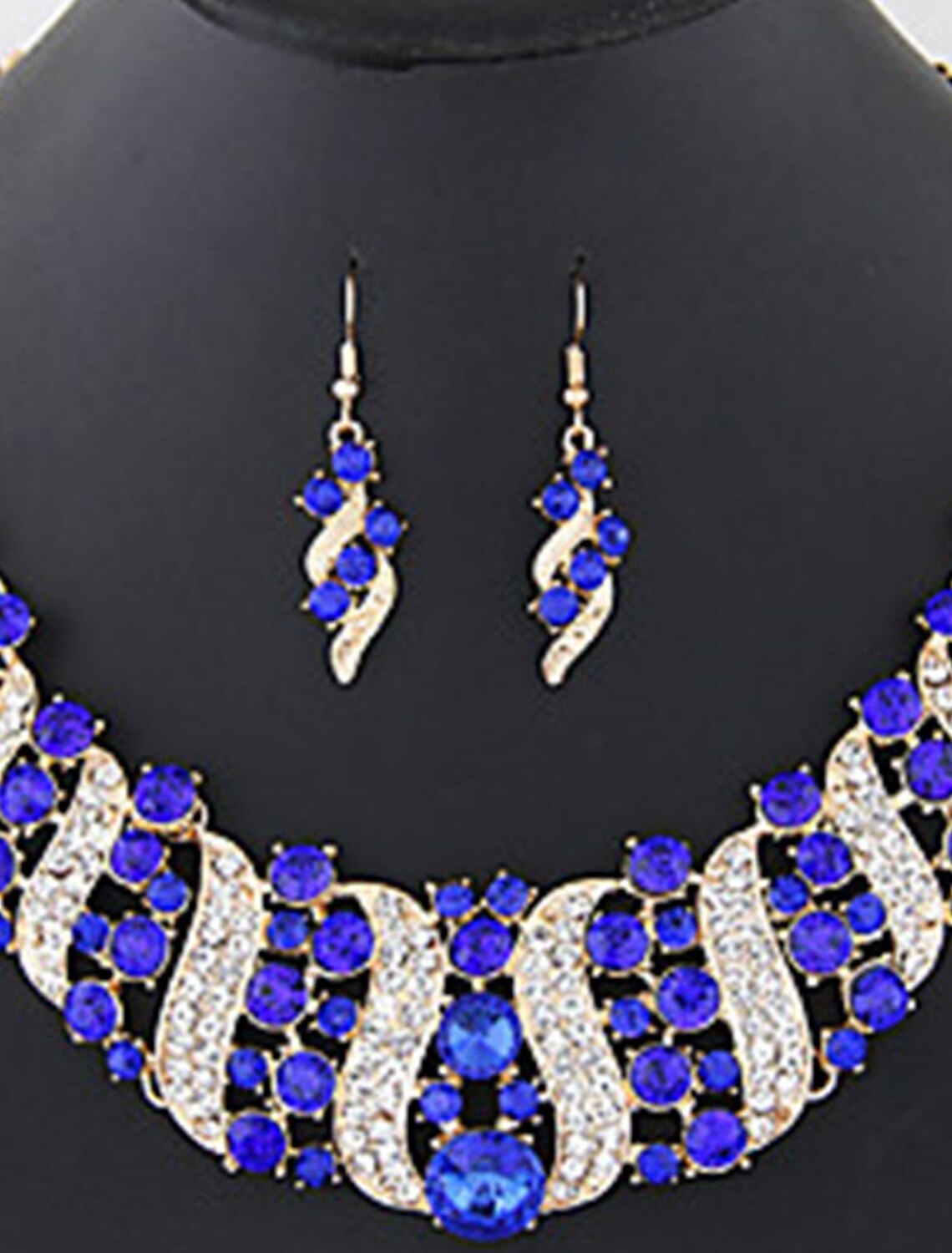 Close-up of a diamond alloy tennis chain necklace with geometrical design.