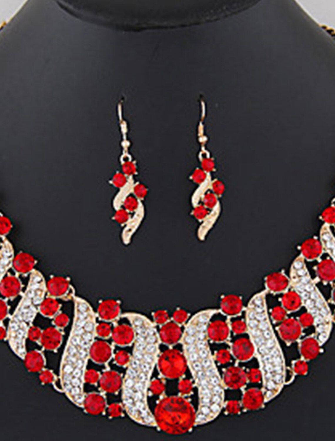 Elegant diamond alloy necklace and earrings set displayed on a white background.