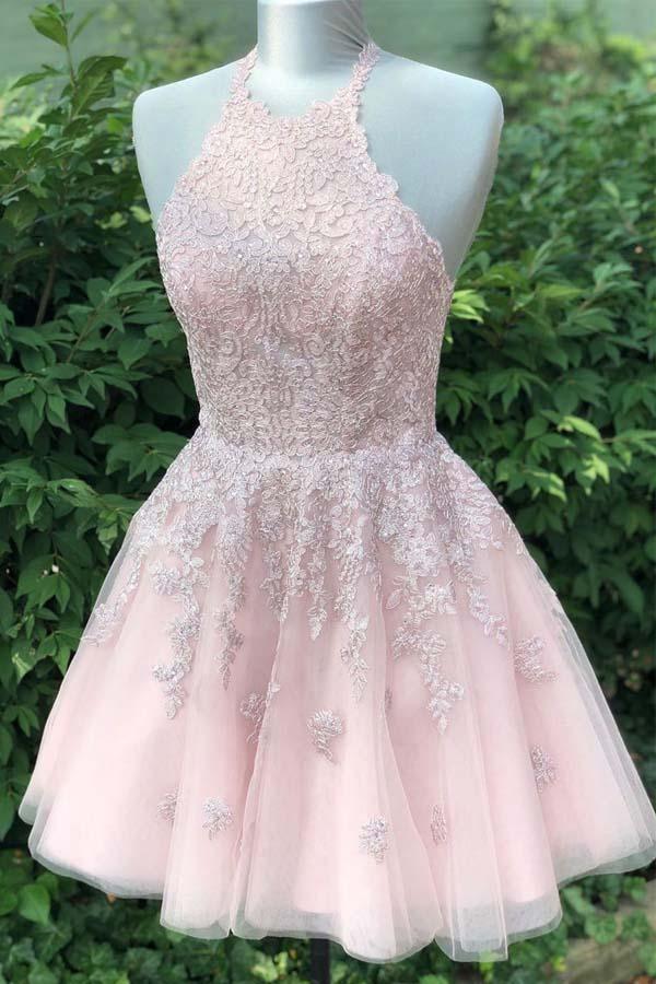 Dusty blush A-line homecoming dress with tulle skirt, V-neck, and spaghetti straps.