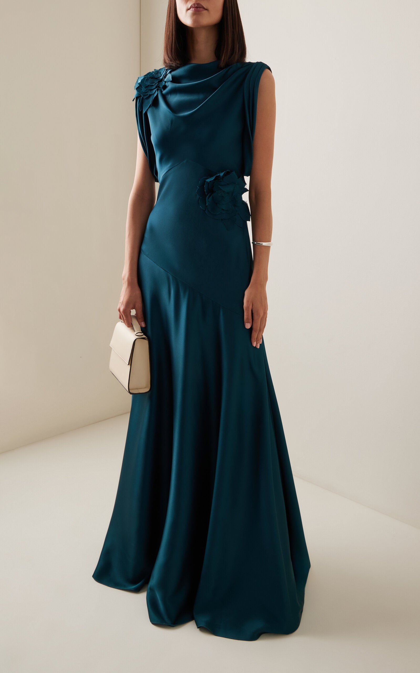 Elegant embellished A-line V-neck satin gown.