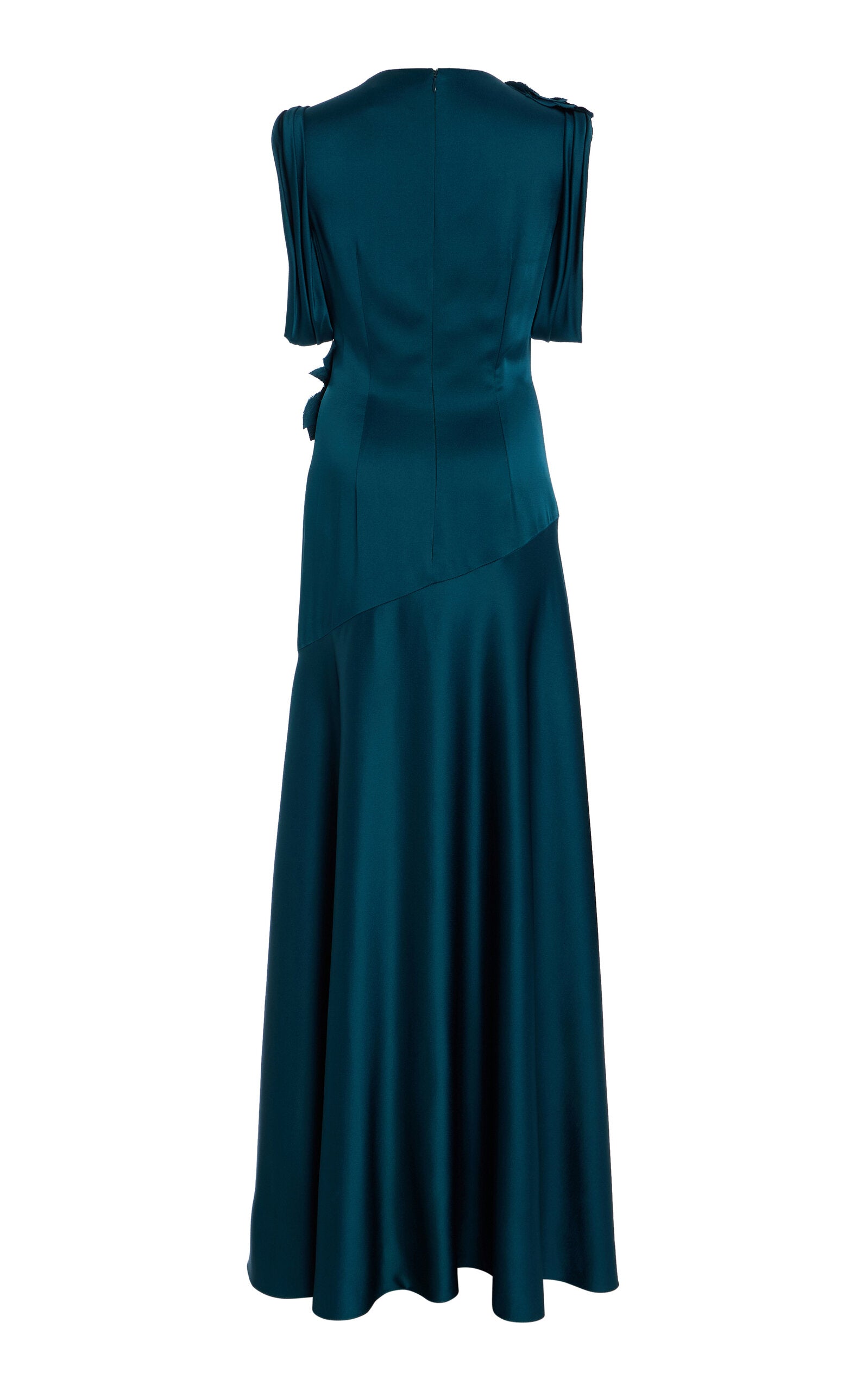 Model posing in elegant sleeveless satin formal dress.