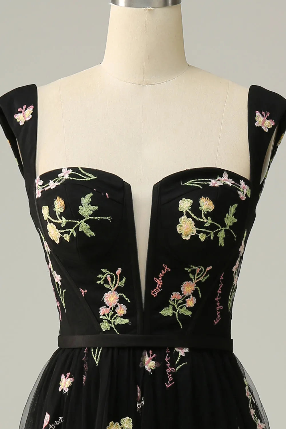 Side view of the flowy A-line skirt and sweetheart neckline.