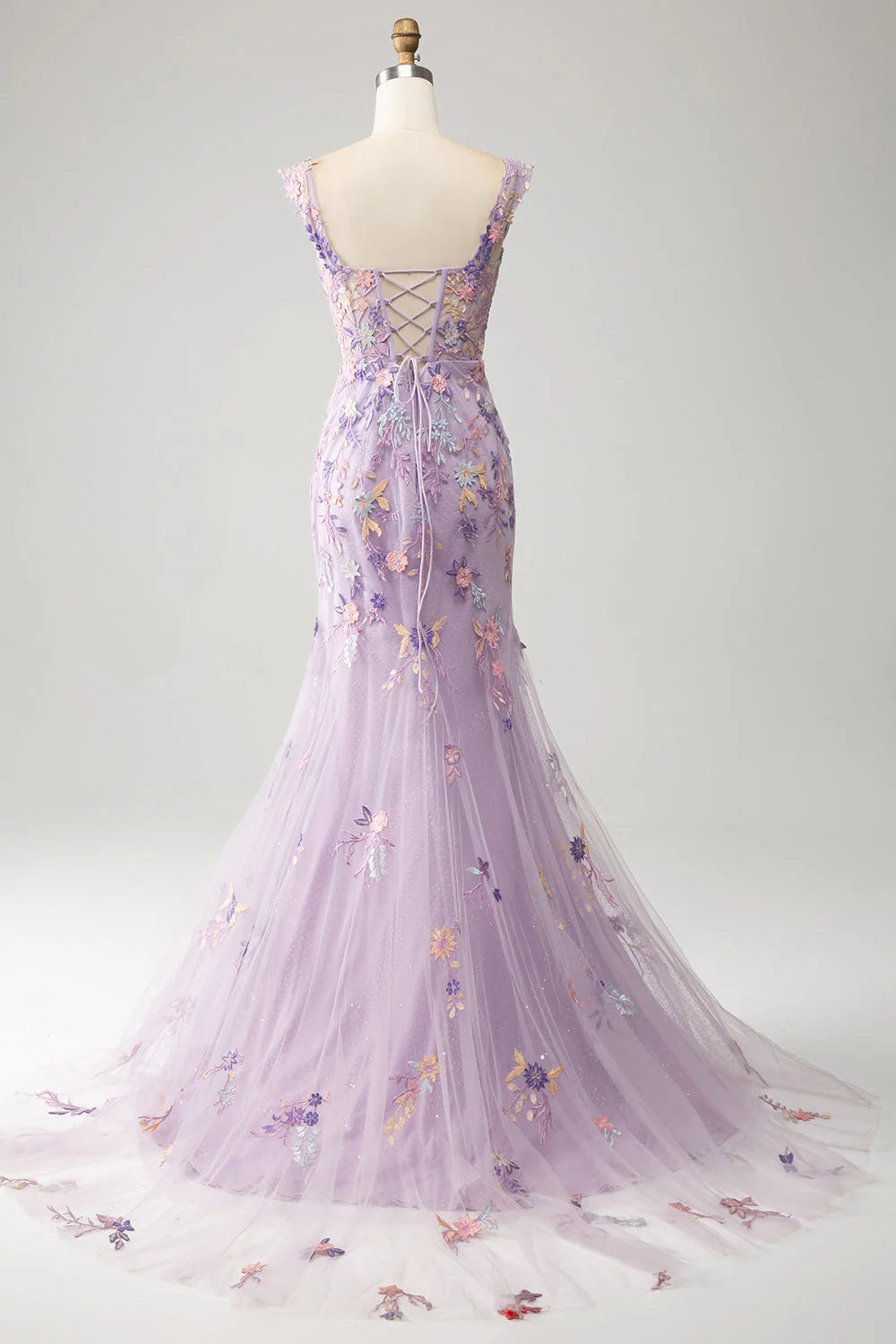 Back view of the mauve embroidered mermaid prom dress, showcasing the intricate embroidery.
