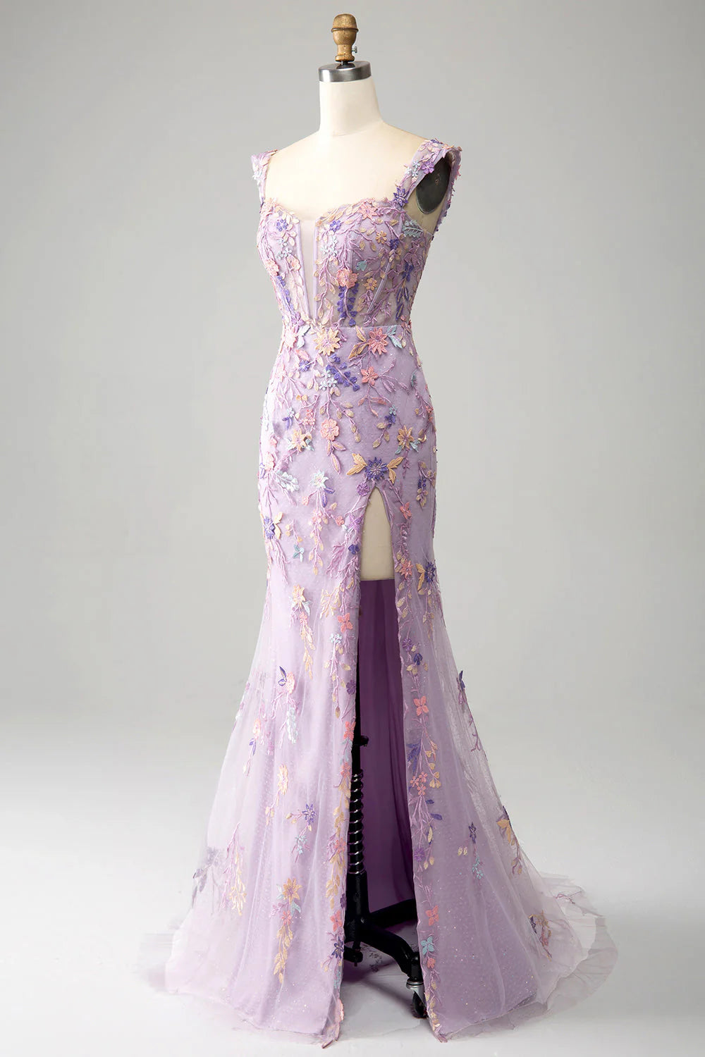 Side view of the mauve embroidered mermaid prom dress, highlighting the mermaid silhouette and leg slit.