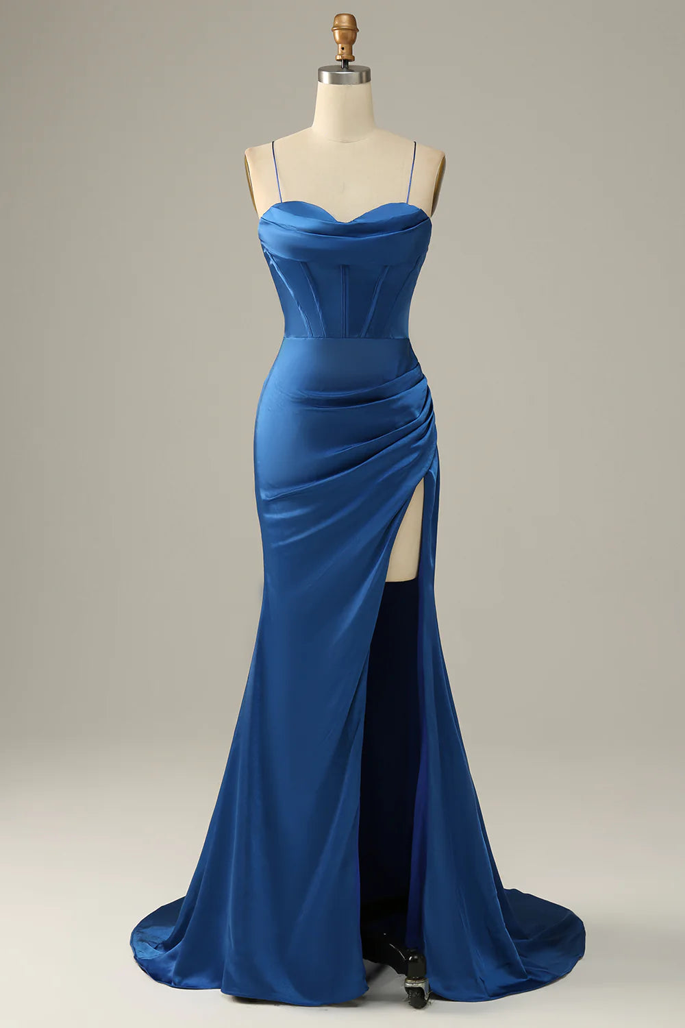 Royal blue satin mermaid gown with spaghetti straps.