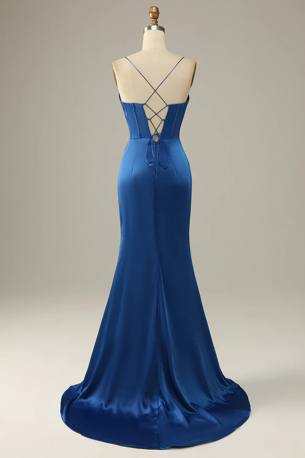 Back view of royal blue satin mermaid gown with a court train.