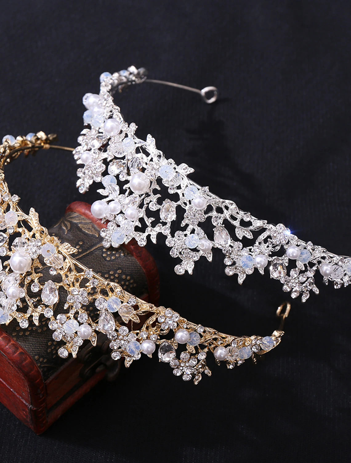 Elegant faux pearl and crystal rhinestone wedding headpiece.