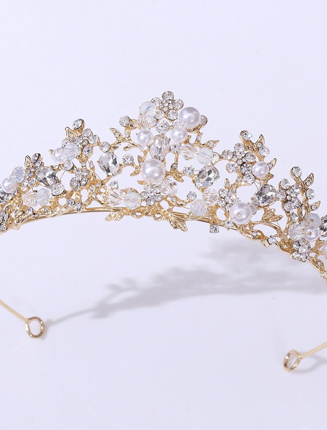 Faux pearl and crystal tiara for special occasions.