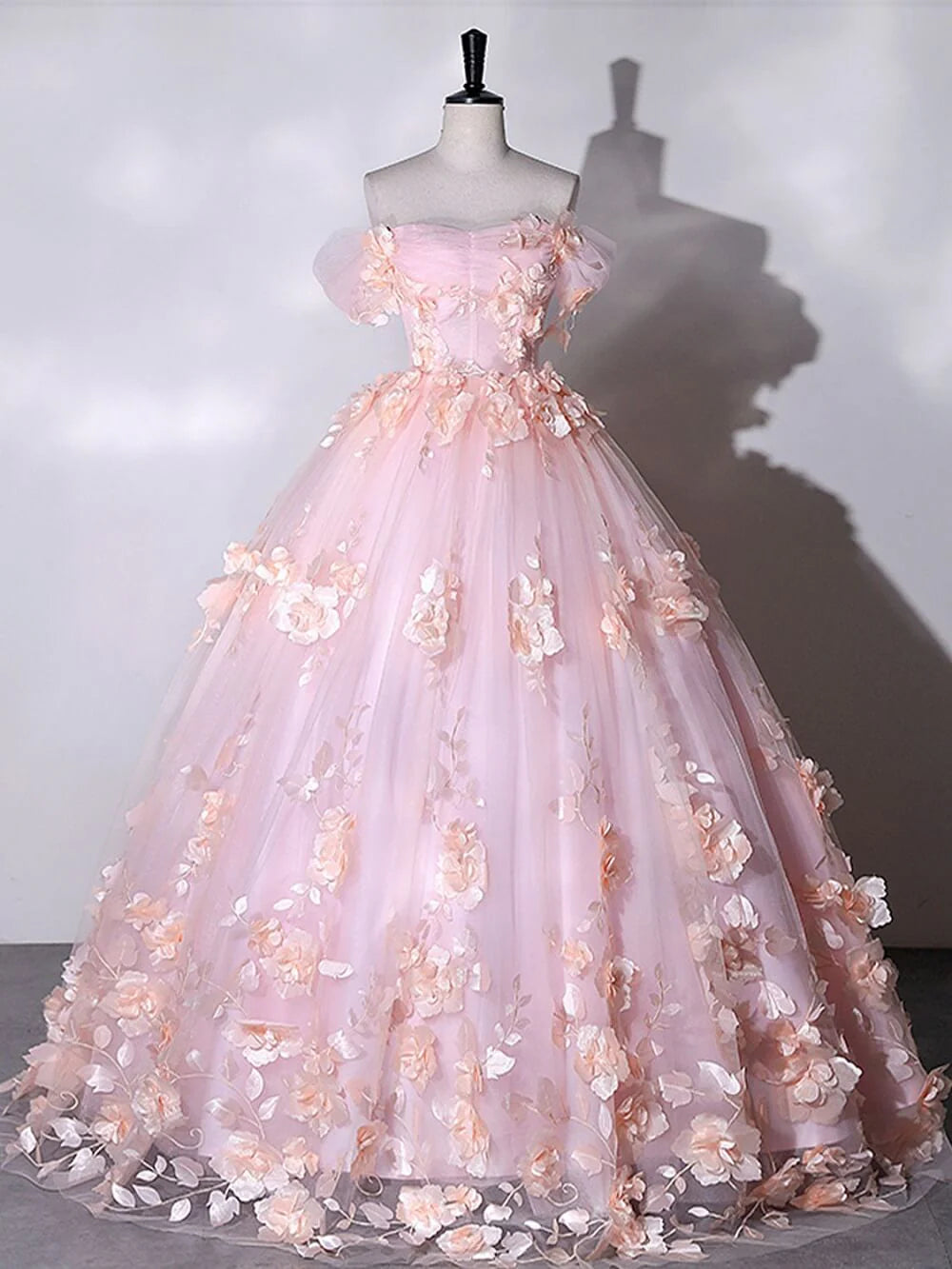 Elegant A-line floral off-the-shoulder ball gown.