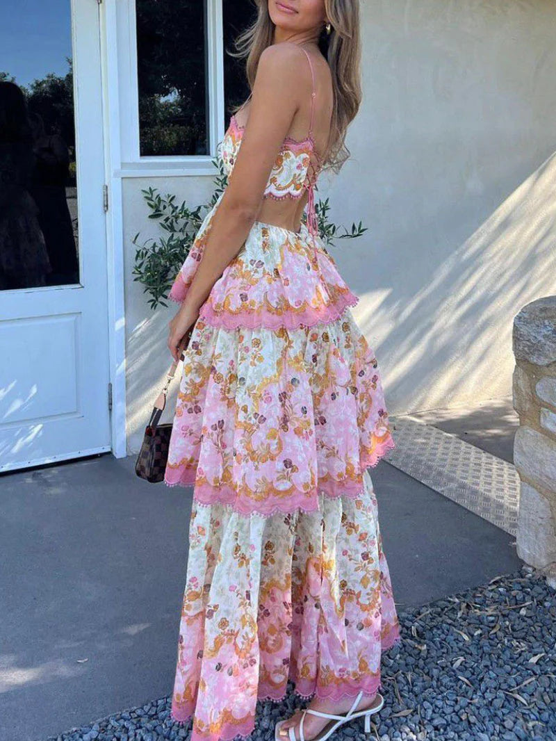 Side profile of the tiered floral print midi dress.