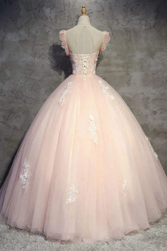 Back view of the long floral prom dress with sheer details.
