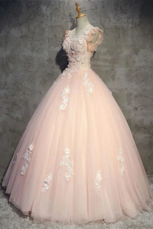 Close-up of the sheer neck and floral embroidery on the ball gown.