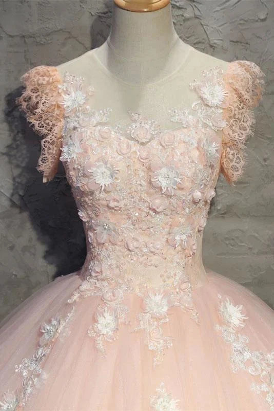 Side view of the flowing tulle skirt on the princess formal dress.