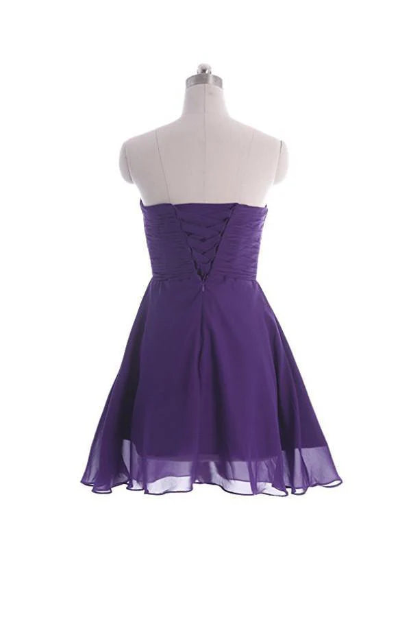 Flowing chiffon strapless gown for formal weddings.