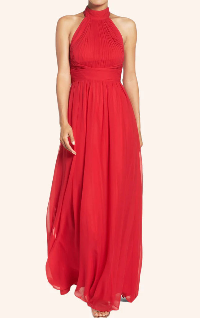 Woman wearing an elegant halter high neck chiffon long prom dress.
