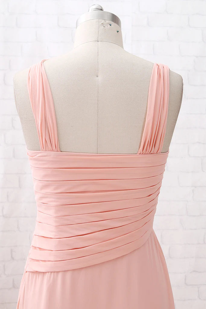 Close-up of the bodice and spaghetti straps of a coral chiffon dress.