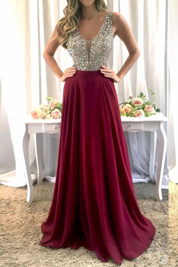 Elegant V-neck chiffon maxi dress with spaghetti straps, suitable for formal events.