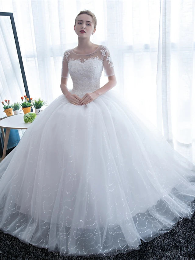 Close-up of the delicate lace and satin fabric on the formal gown.