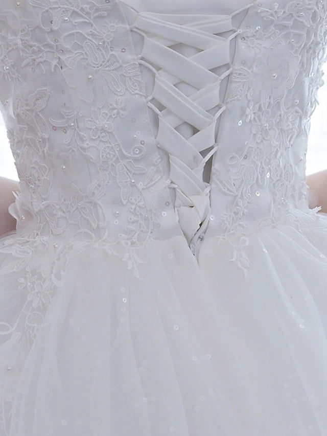Model wearing the half sleeve illusion neck wedding dress.