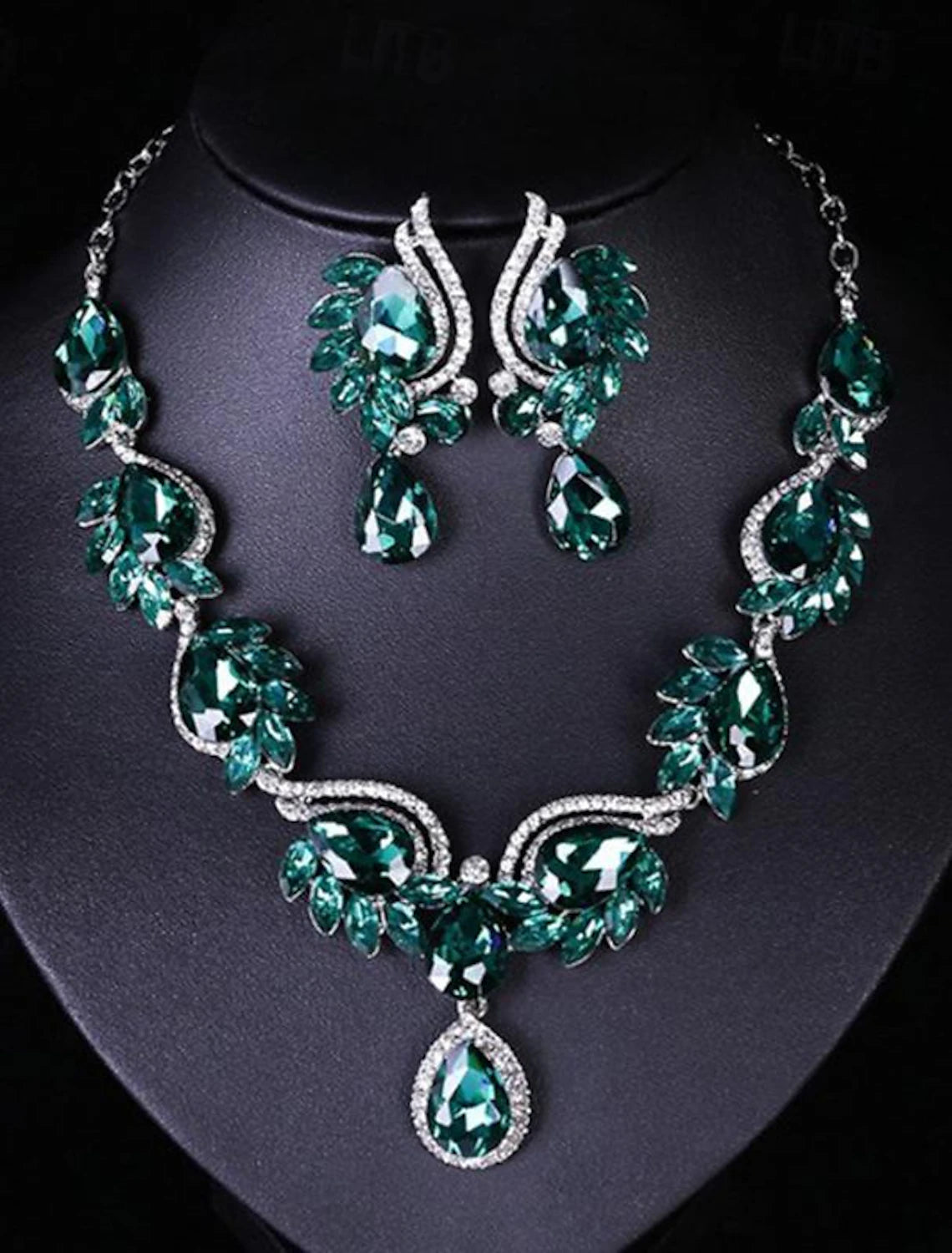 Close-up of geometric glass alloy necklace.