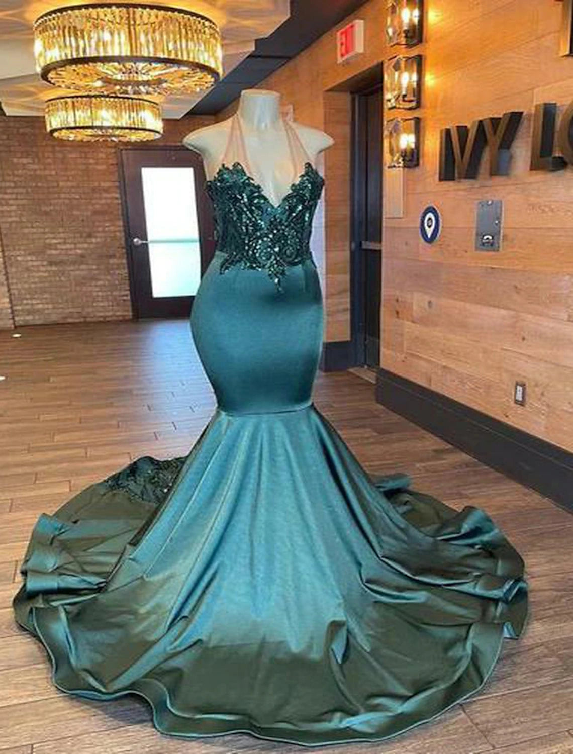 Elegant glittering mermaid trumpet quinceanera gown.
