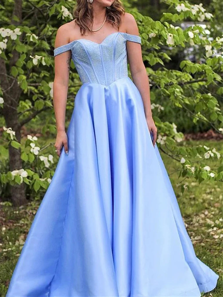 Woman wearing an elegant off-shoulder satin A-line long prom dress.
