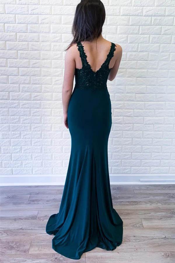 Side view of green satin mermaid formal dress, showcasing appliques.