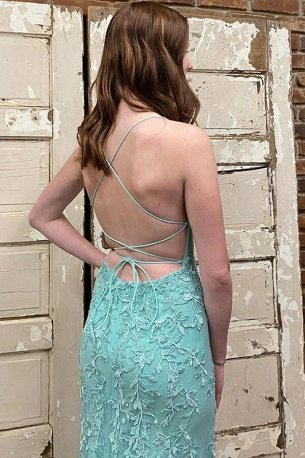 Full view of a green tulle mermaid prom dress with scoop neck and lace-up back.