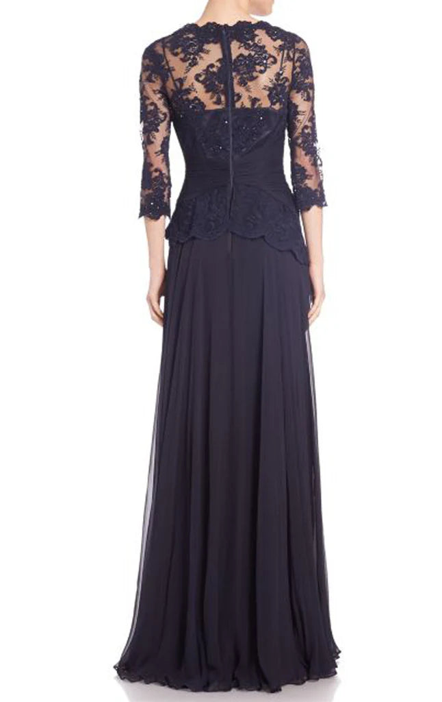 Side view of a sophisticated half sleeve lace chiffon formal gown.