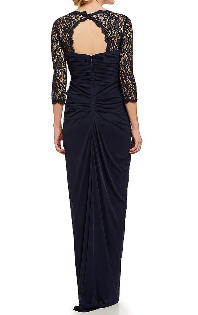 Ankle-length lace gown with half sleeves, side view.