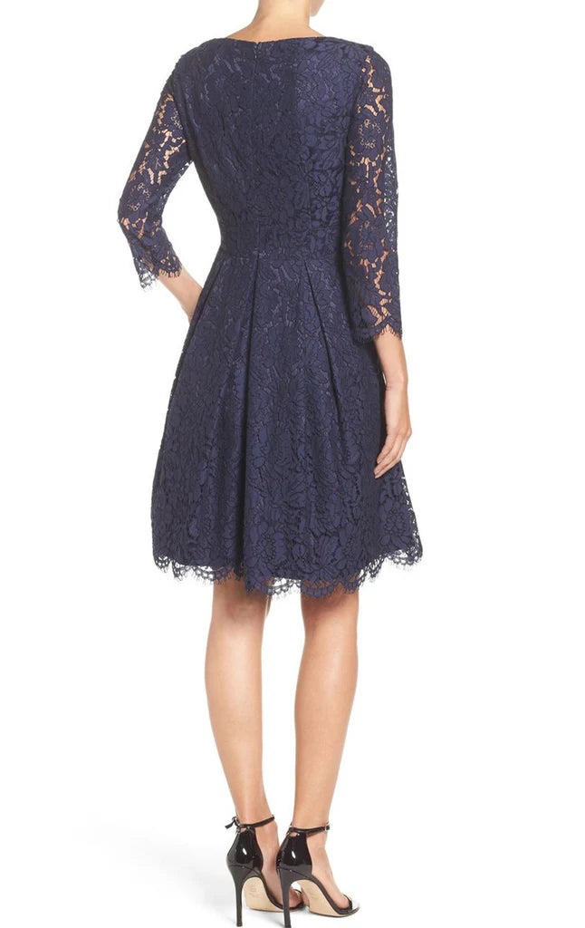 Elegant A-line Mother of the Bride dress with V-neck, half sleeves, and lace details.
