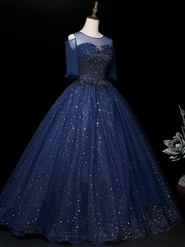 Back view of the long prom dress with half sleeves and intricate beading.