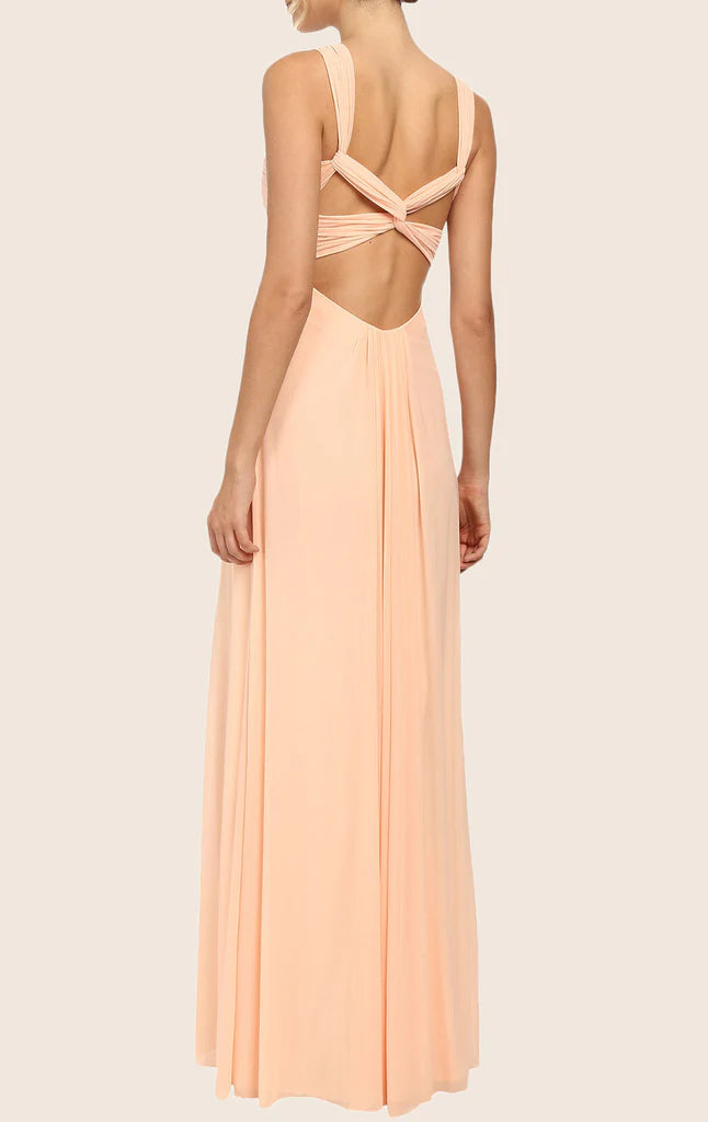 Back view of the long chiffon formal gown showing cross straps.