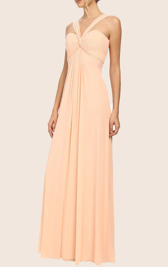 Side view of the flowing halter prom dress.