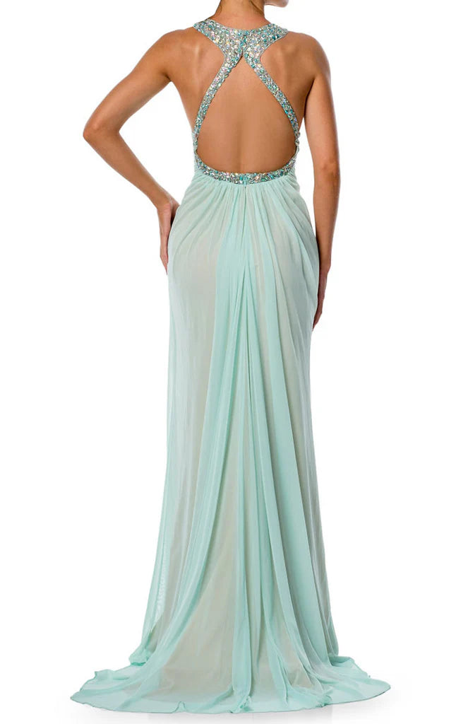 Elegant long chiffon prom dress with halter neckline and crystal embellishments.
