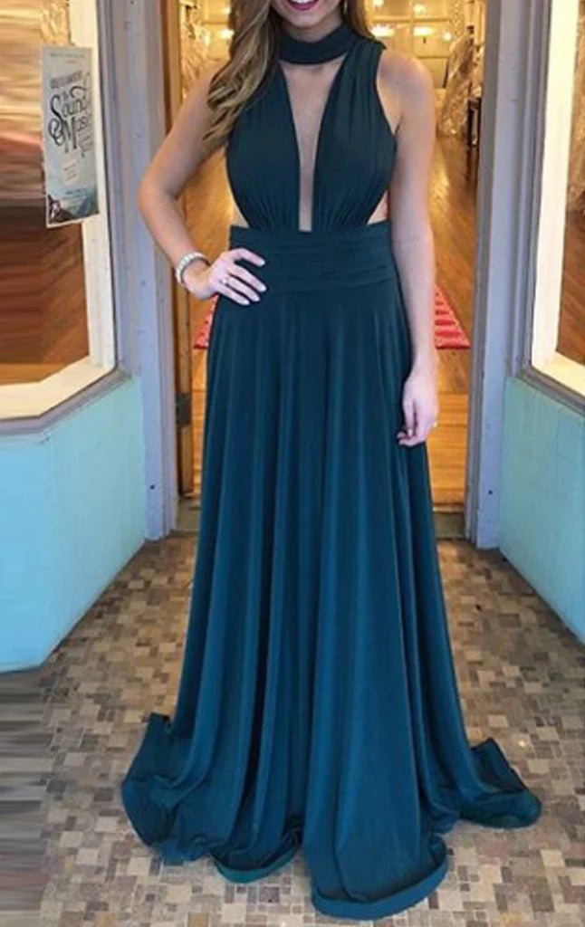 Elegant halter deep V-neck A-line maxi prom dress on a model.