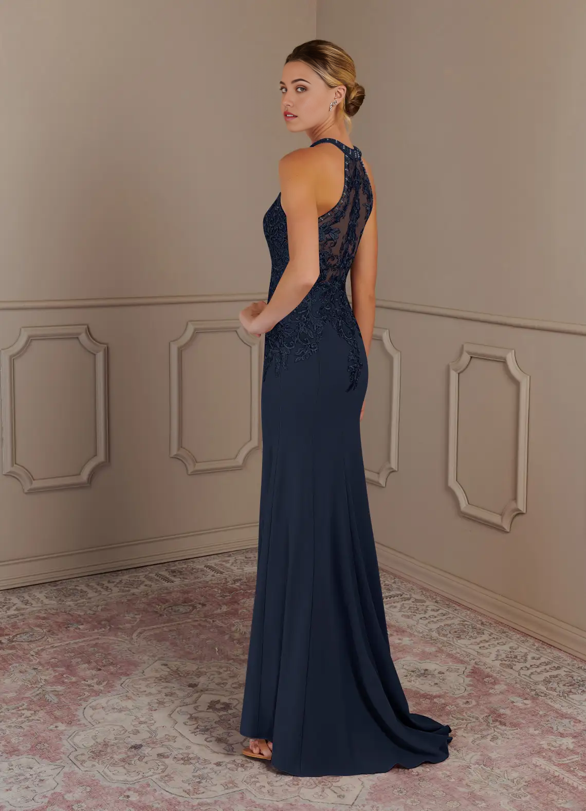 Close-up of the intricate lace detail on the dark navy dress.